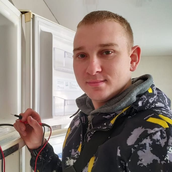Николай